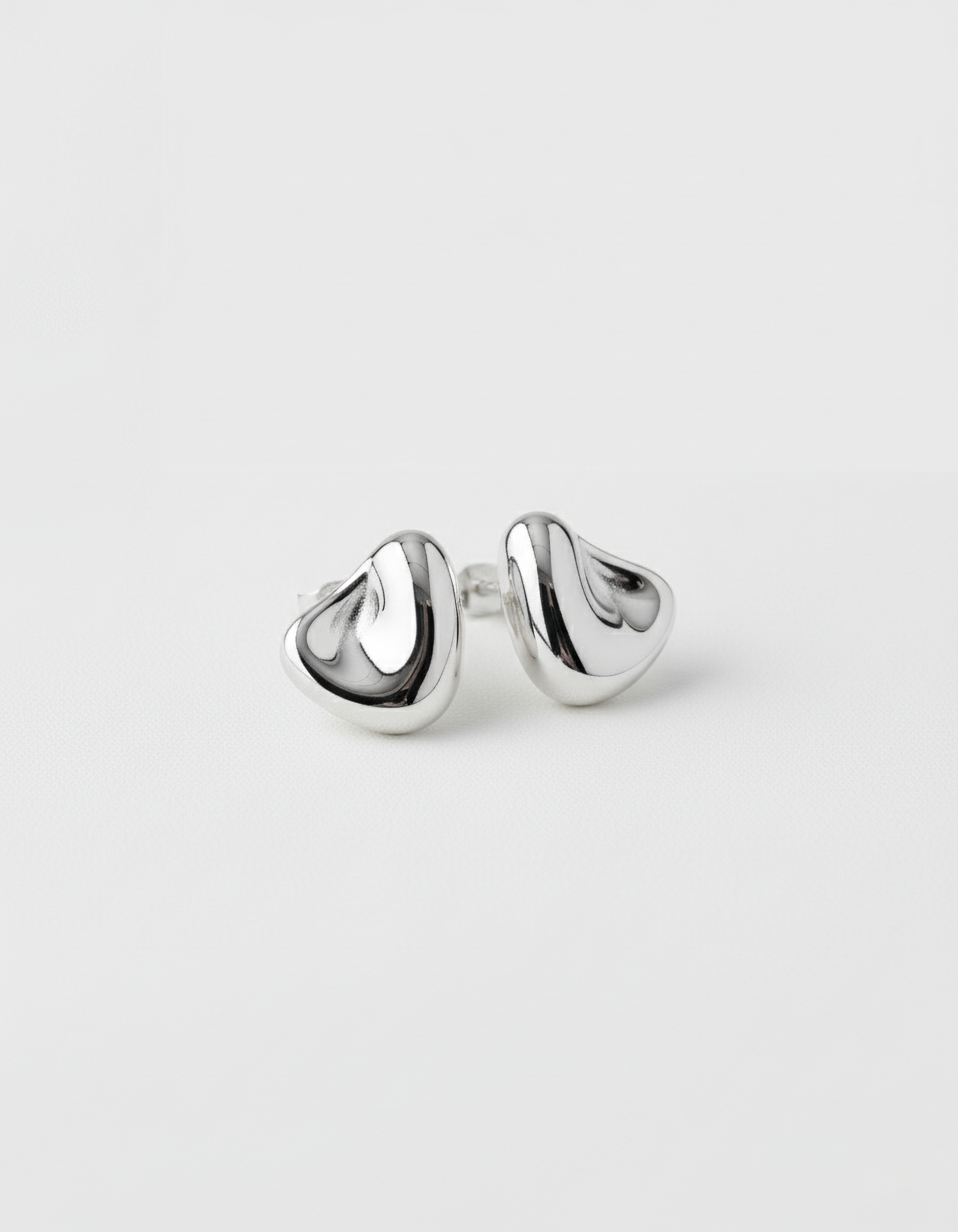 ahrensandco Mid-Century Stud Ohrstecker aus Edelstahl mit polierter Oberfläche – minimalistisches Unisex-Design inspiriert von Paris
