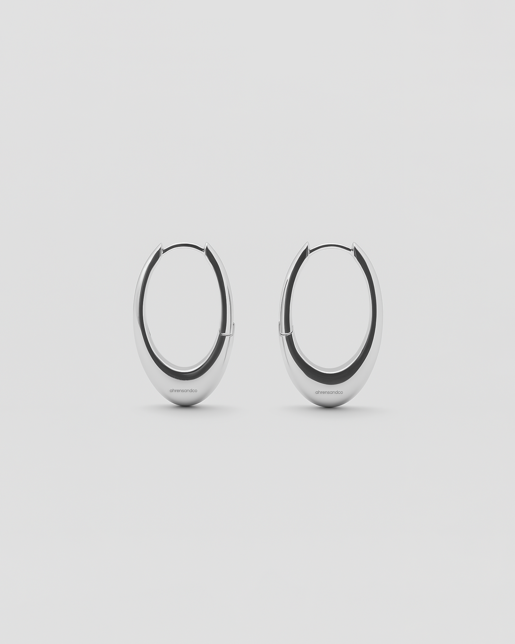 ahrensandco Orbit Earring aus 925 Sterling Silber – polierte Creolen mit Click-Verschluss, minimalistisches Design, made in Paris
