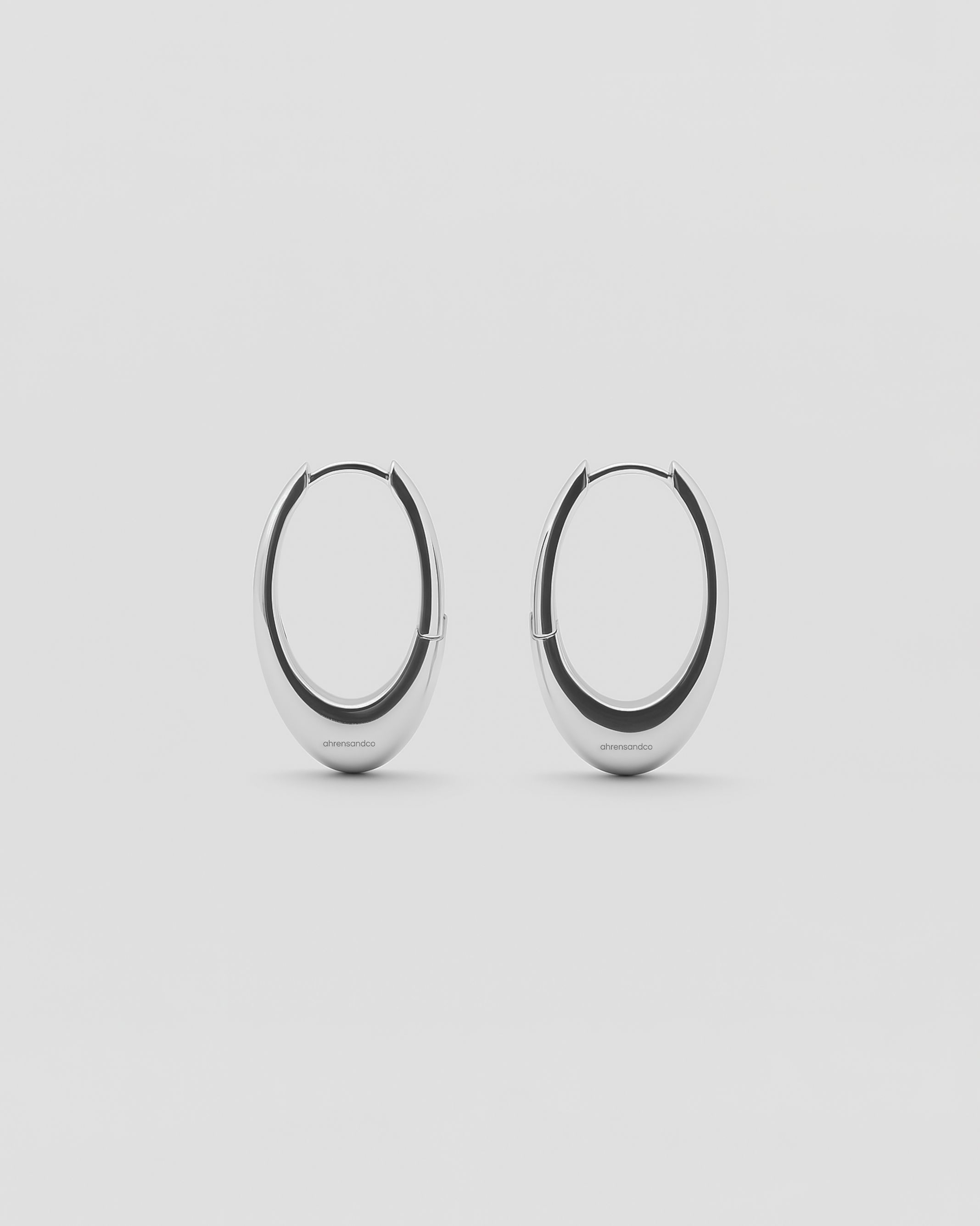ahrensandco Orbit Earring aus 925 Sterling Silber – polierte Creolen mit Click-Verschluss, minimalistisches Design, made in Paris
