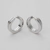 Ahrens & Co Mobius Era earrings in motion – minimalist silver hoops showcased from all angles